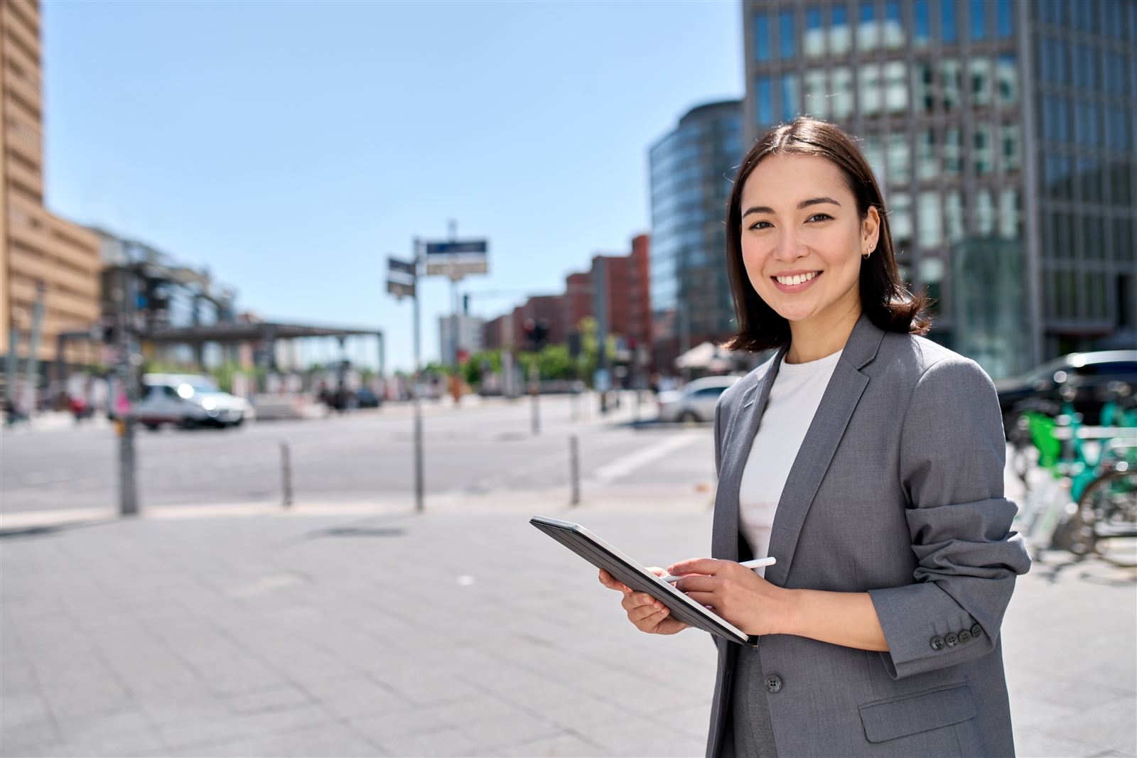 A newcomer to Japan smiling in the city